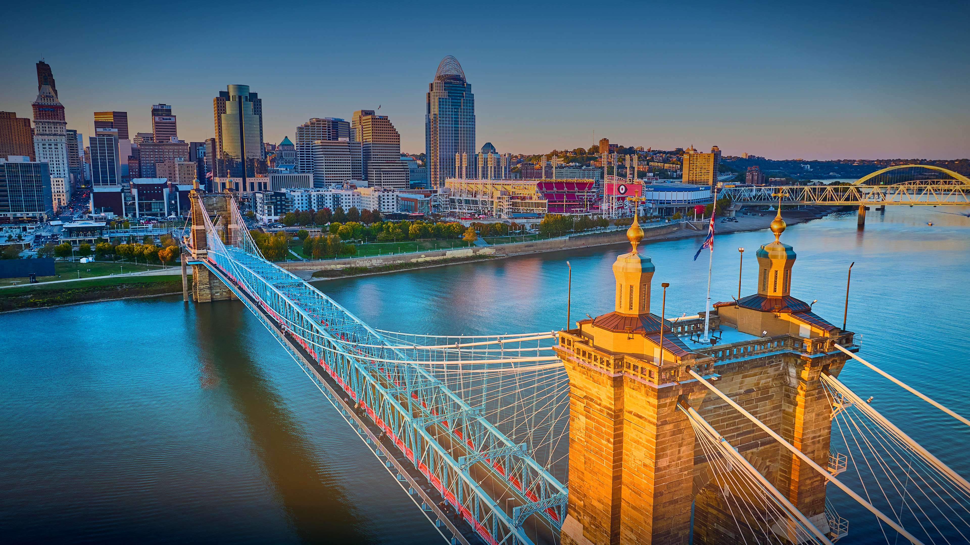 The Cincinnati skyline and Roebling Suspension Bridge at dusk